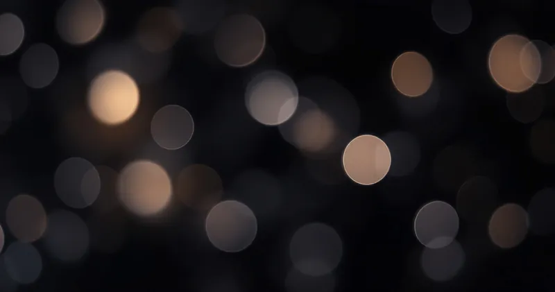 Interlinked soft circles of light on a dark background (illustration)