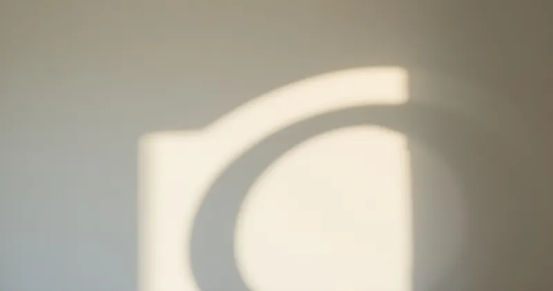 Repeating soft arcs of light on a plain wall (illustration)