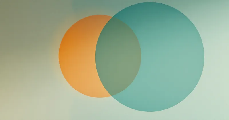 Two overlapping circles of coloured light on a plain wall (illustration)