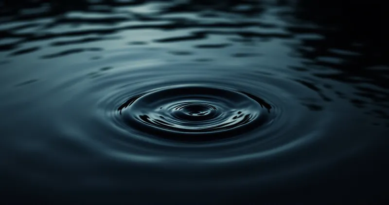 Dark still surface of water with a single ripple (illustration)