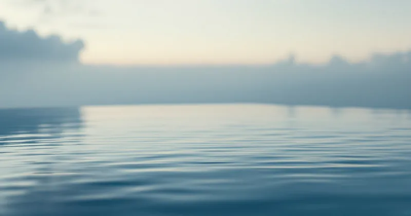 Edge of a calm pool meeting a soft horizon at dusk (illustration)