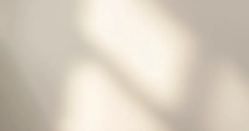 Clear glass vessels on a bright windowsill in soft focus (illustration)