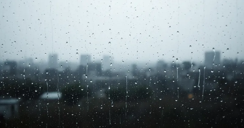 Rain running down a plain window pane (illustration)