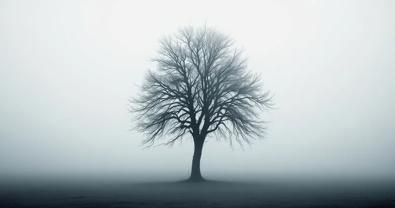 Single bare tree in soft fog on open ground (illustration)