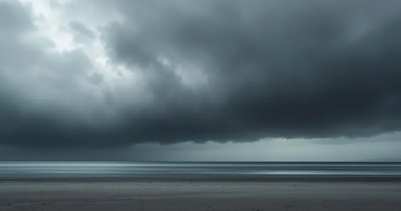 Heavy grey cloud over a quiet empty shoreline (illustration)